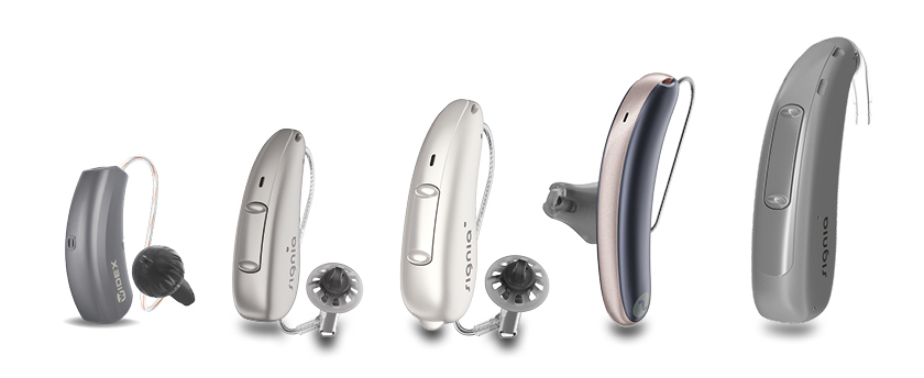 A group of three different types of hearing aids.