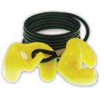 A yellow pair of ear plugs sitting on top of a black cord.