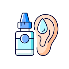 A bottle of ear drops next to an ear.